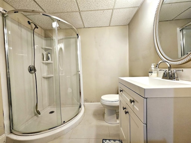 20 Upland Rd, Marlborough, MA 01752 - bathroom featuring a drop ceiling, a stall shower, vanity, and tile patterned flooring