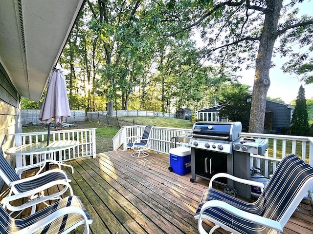 20 Upland Rd, Marlborough, MA 01752 - wooden terrace featuring area for grilling, a fenced backyard, and view of scattered trees