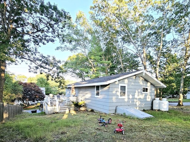 20 Upland Rd, Marlborough, MA 01752 - view of side of home with a wooden deck