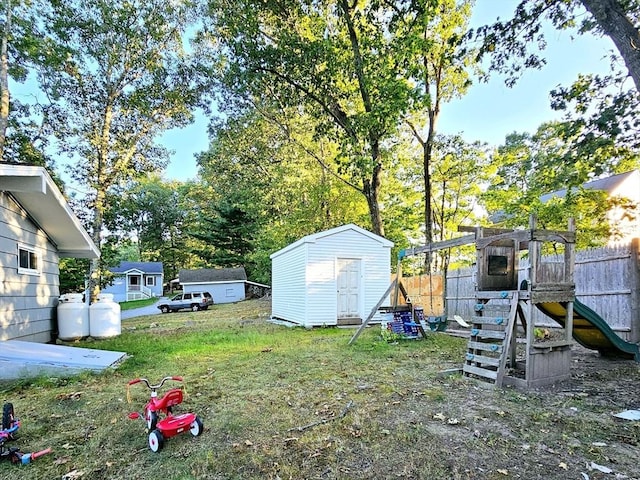 20 Upland Rd, Marlborough, MA 01752 - view of yard featuring a playground and a shed