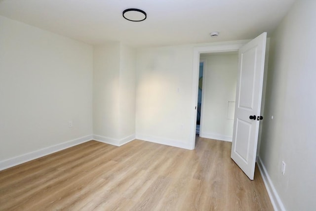 empty room featuring light hardwood / wood-style floors