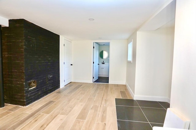 hallway featuring hardwood / wood-style floors