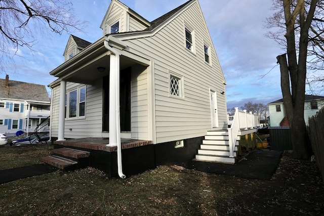 view of home's exterior featuring a porch