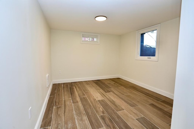 basement featuring wood-type flooring