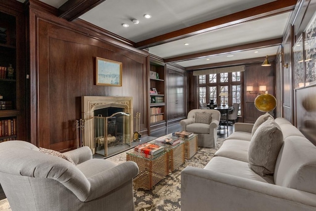 1014 Boylston St, Brookline, MA 02467 - living room with beam ceiling, a fireplace with flush hearth, and wooden walls