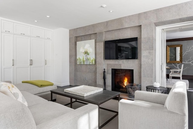 1014 Boylston St, Brookline, MA 02467 - living area with baseboards, a fireplace, and recessed lighting
