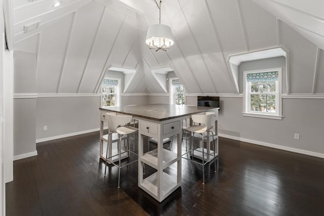 1014 Boylston St, Brookline, MA 02467 - dining space featuring plenty of natural light, vaulted ceiling, dark wood-style floors, and baseboards