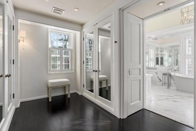 1014 Boylston St, Brookline, MA 02467 - foyer entrance featuring baseboards, recessed lighting, and dark wood-type flooring