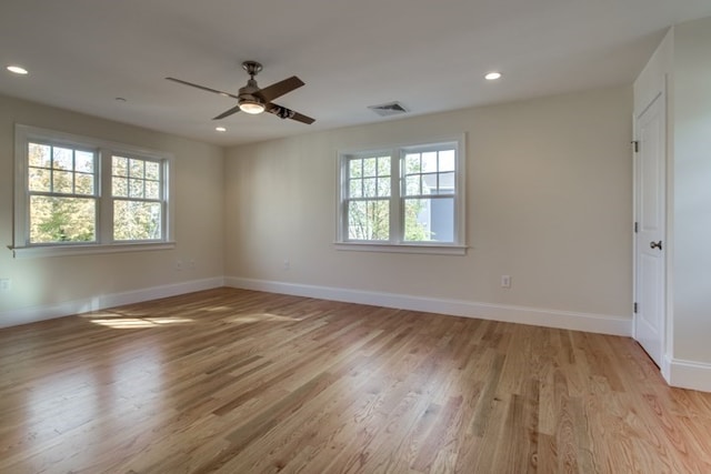 unfurnished room with light hardwood / wood-style flooring and ceiling fan