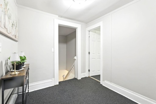 interior space with dark carpet