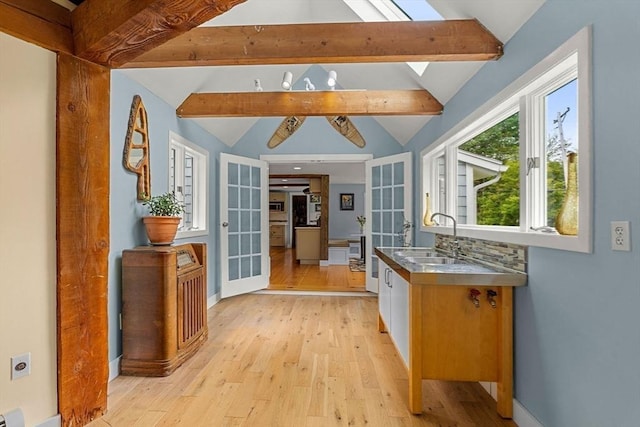 94 Kimball Rd, Amesbury, MA 01931 - kitchen featuring stainless steel counters, light wood-style flooring, and french doors