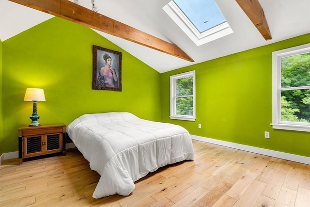 94 Kimball Rd, Amesbury, MA 01931 - bedroom featuring a skylight, multiple windows, and wood finished floors