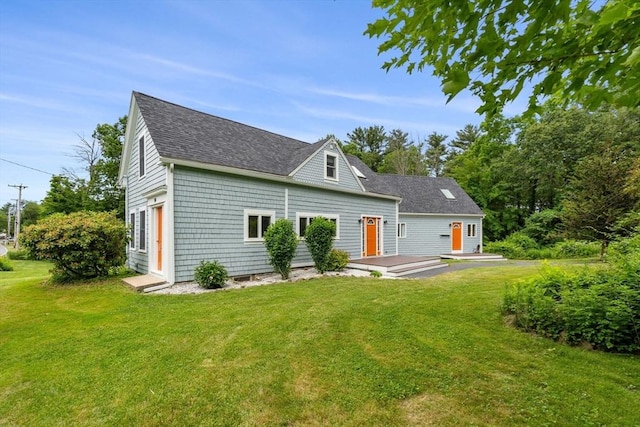 94 Kimball Rd, Amesbury, MA 01931 - view of front of property featuring a front yard and a shingled roof