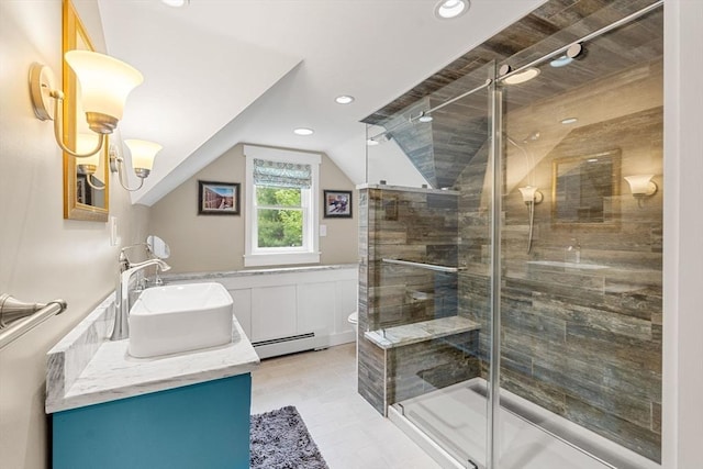 94 Kimball Rd, Amesbury, MA 01931 - bathroom with a baseboard heating unit, vanity, a stall shower, lofted ceiling, and recessed lighting