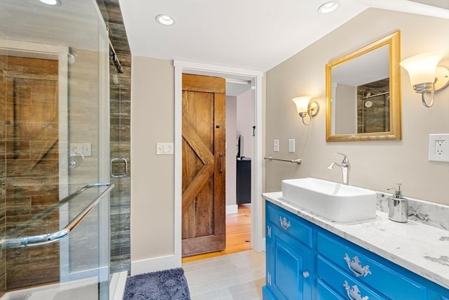 94 Kimball Rd, Amesbury, MA 01931 - bathroom featuring vanity, a shower stall, recessed lighting, and tile patterned floors