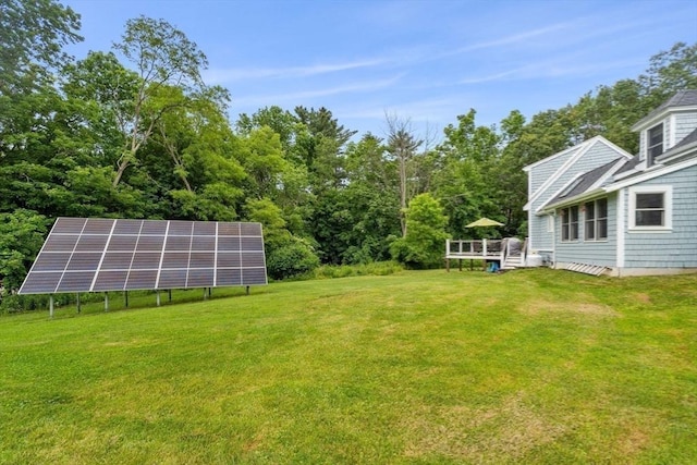 94 Kimball Rd, Amesbury, MA 01931 - view of green lawn with a wooden deck
