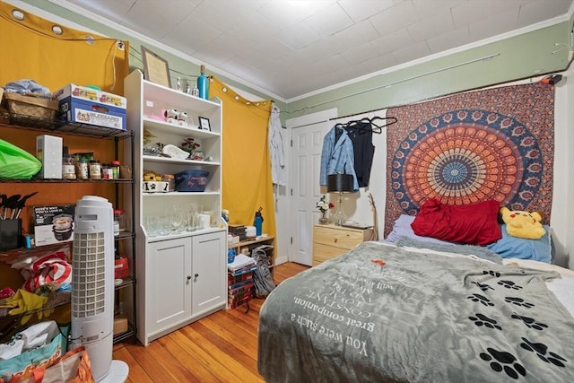 69 Conwell Ave, Somerville, MA 02144 - bedroom with ornamental molding and light wood finished floors