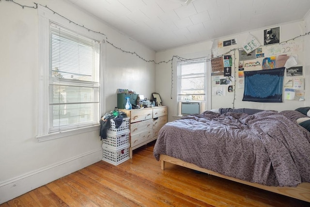 69 Conwell Ave, Somerville, MA 02144 - bedroom featuring wood finished floors and baseboards