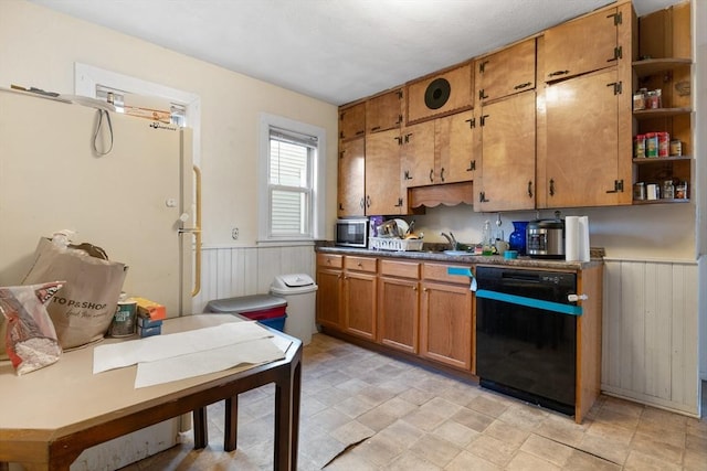 69 Conwell Ave, Somerville, MA 02144 - kitchen with dishwasher, wainscoting, brown cabinetry, stainless steel microwave, and open shelves