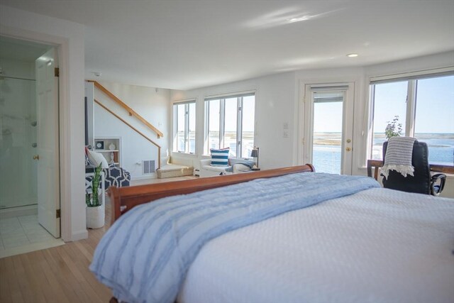18 Wendy Way, Dennis, MA 02670 - bedroom featuring visible vents, access to outside, recessed lighting, connected bathroom, and light wood-style flooring