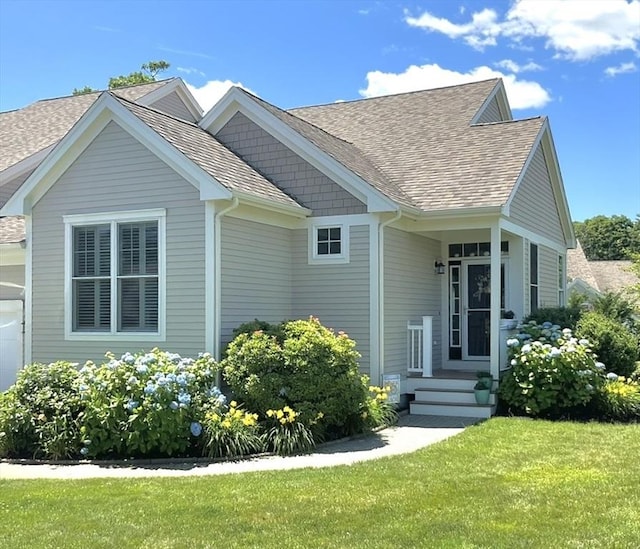 16 Twin Oaks Dr Unit 732, Mashpee, MA 02649 - rear view of house featuring a yard and a shingled roof