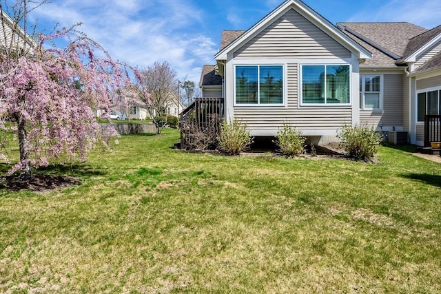 16 Twin Oaks Dr Unit 732, Mashpee, MA 02649 - view of side of home featuring a lawn, cooling unit, and a shingled roof