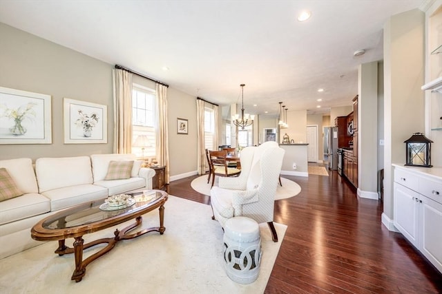 16 Twin Oaks Dr Unit 732, Mashpee, MA 02649 - living room featuring baseboards, recessed lighting, dark wood finished floors, and a chandelier