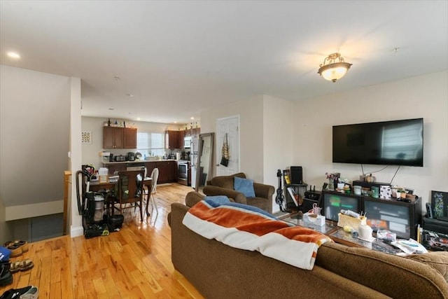 54 Primrose St Unit 3, Haverhill, MA 01830 - living area featuring light wood finished floors and recessed lighting