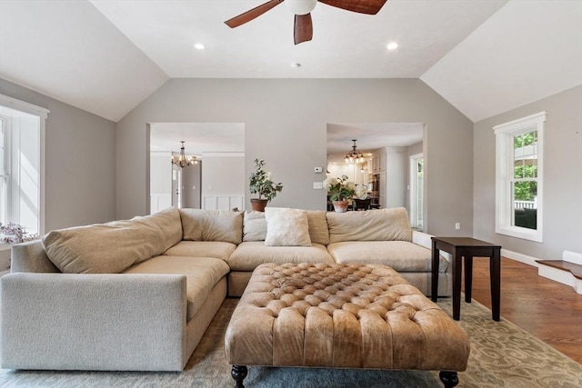 3 Chad Ln, Sterling, MA 01564 - living room featuring a chandelier, vaulted ceiling, wood finished floors, a ceiling fan, and baseboards