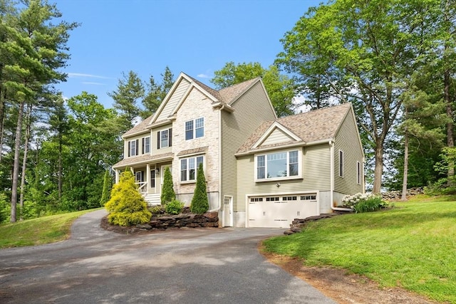 3 Chad Ln, Sterling, MA 01564 - view of front of property featuring asphalt driveway, an attached garage, a front lawn, and a shingled roof