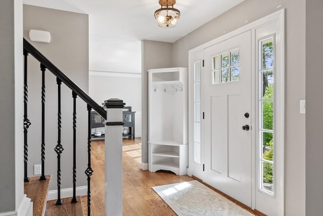 3 Chad Ln, Sterling, MA 01564 - foyer featuring wood finished floors, stairs, and baseboards