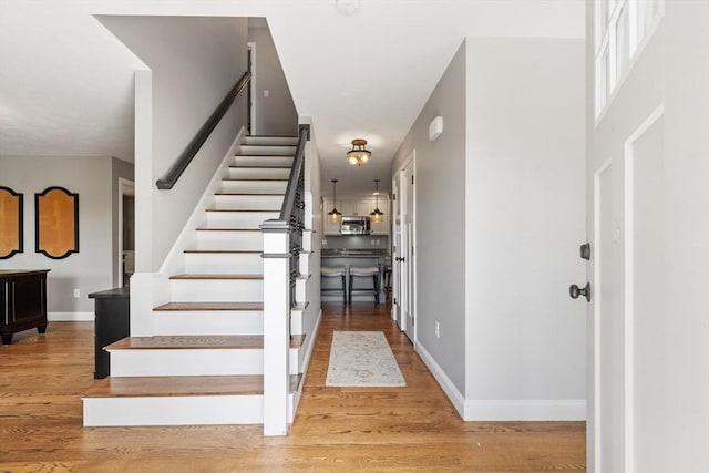 3 Chad Ln, Sterling, MA 01564 - stairway featuring wood finished floors and baseboards