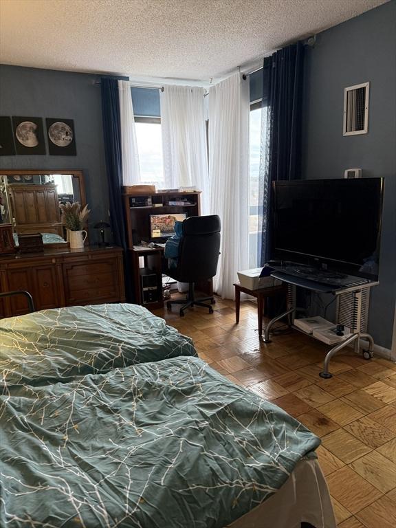 bedroom with a textured ceiling