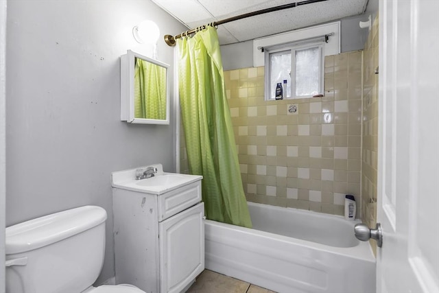 77-79 Grenada Ter, Springfield, MA 01108 - bathroom featuring shower / bath combination with curtain, toilet, vanity, and tile patterned flooring