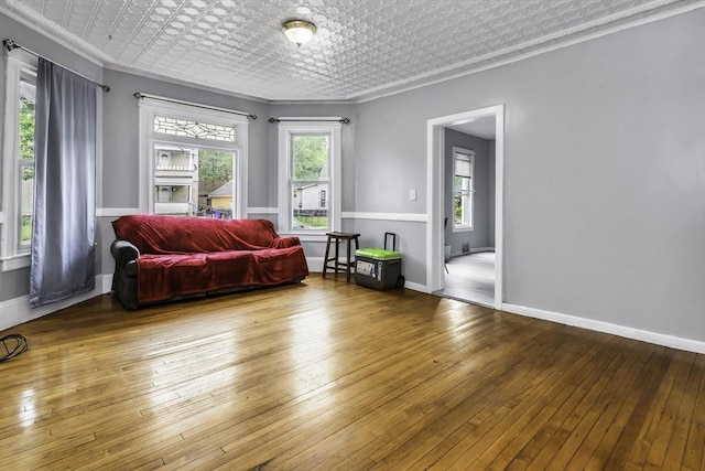 77-79 Grenada Ter, Springfield, MA 01108 - sitting room featuring ornamental molding, wood-type flooring, an ornate ceiling, and baseboards