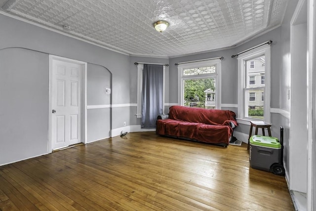 77-79 Grenada Ter, Springfield, MA 01108 - living area with an ornate ceiling, hardwood / wood-style floors, and ornamental molding