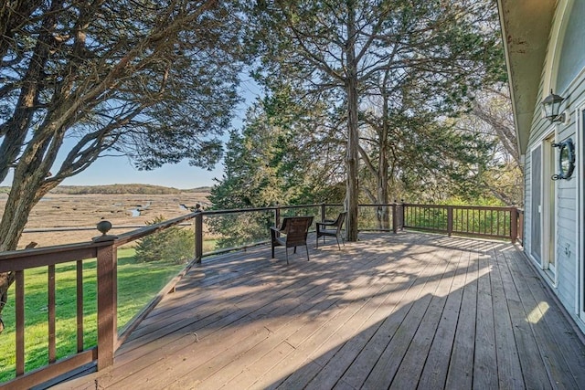 deck featuring a yard