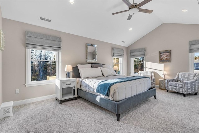 bedroom featuring lofted ceiling, ceiling fan, visible vents, baseboards, and carpet