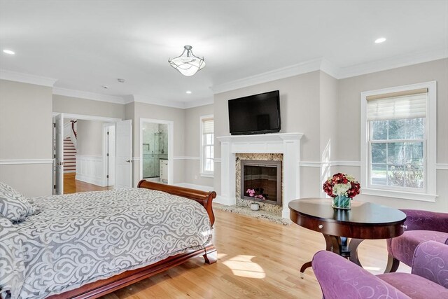 42 Westerly Rd, Weston, MA 02493 - bedroom featuring wood finished floors, recessed lighting, a premium fireplace, and ornamental molding