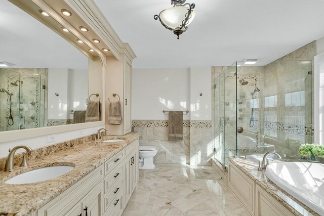 42 Westerly Rd, Weston, MA 02493 - full bath featuring tile walls, a shower stall, a bath, recessed lighting, and double vanity