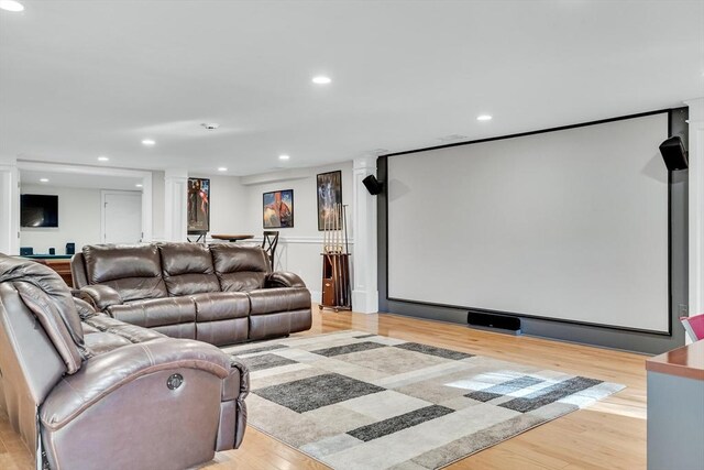 42 Westerly Rd, Weston, MA 02493 - home theater room with light wood-style flooring, recessed lighting, and decorative columns
