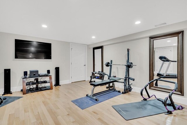 42 Westerly Rd, Weston, MA 02493 - exercise room with wood finished floors, baseboards, and recessed lighting