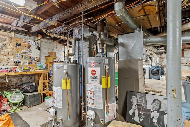 utilities featuring water heater and independent washer and dryer