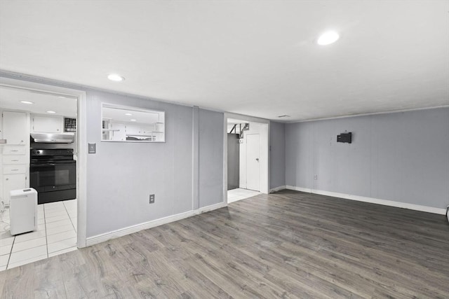 unfurnished room with light hardwood / wood-style floors