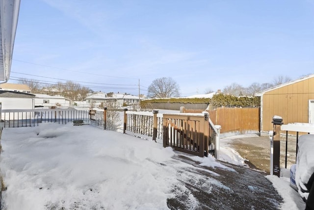 view of snow covered deck