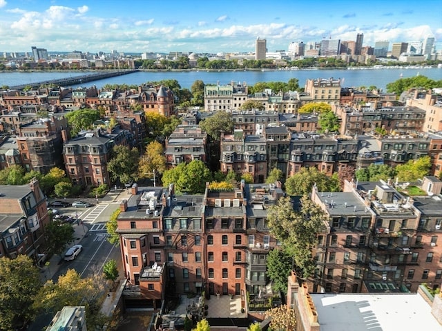 bird's eye view with a water view