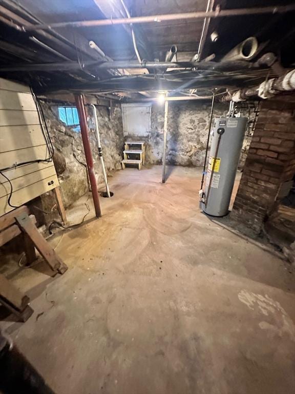 2 Water St, Stoughton, MA 02072 - unfinished basement with water heater
