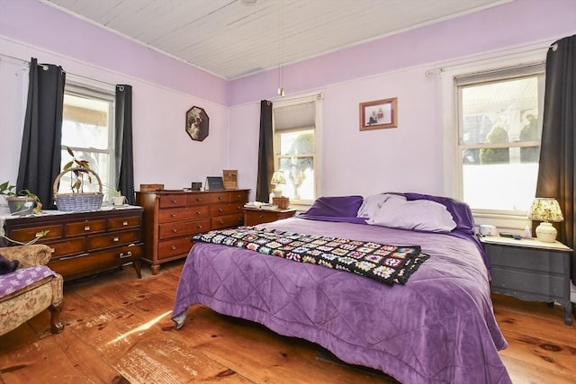 bedroom with wood-type flooring