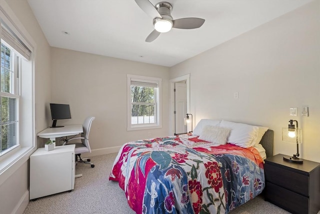 bedroom with carpet floors, baseboards, and ceiling fan