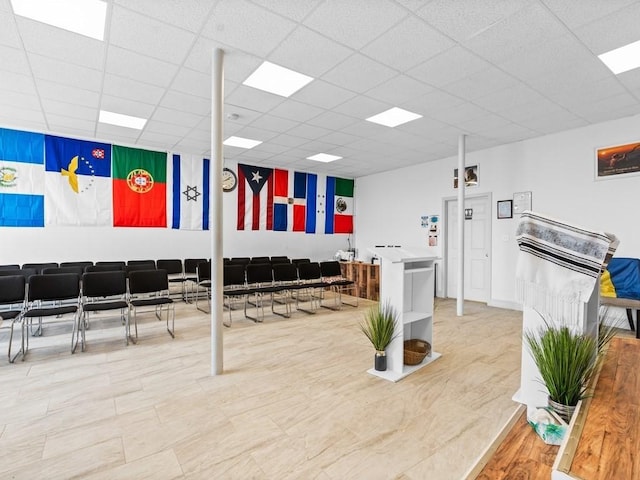 misc room with a drop ceiling